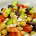 Garbanzo been salad with fresh veggies and Feta cheese.